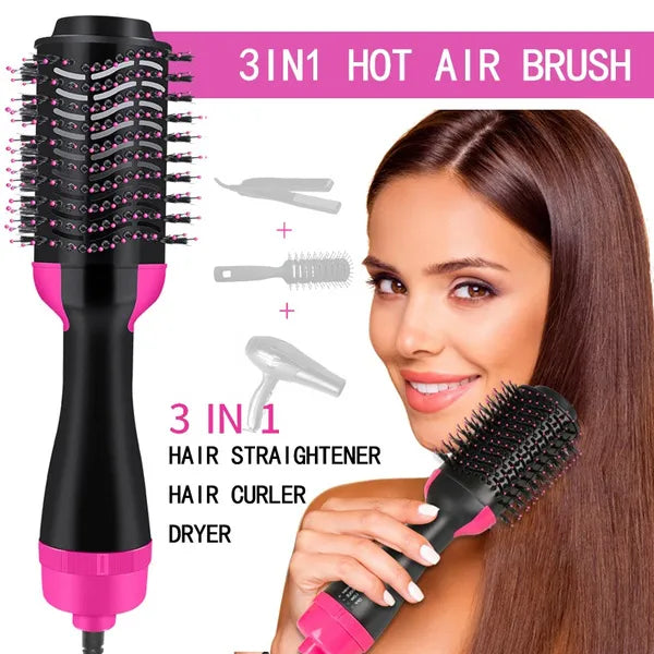 One Step 2-in-1 hair dryer and styler brush in hand, showing oval brush design.