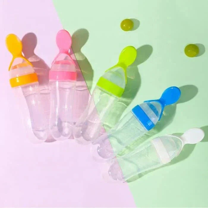 New Born Baby'S Squeeze Feeding Silicon Bottle Spoon Feeder - awanix.pk