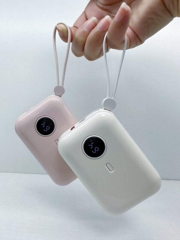 P11 mini power bank 10000mAh with digital display, fast charging, and built-in cable for smartphones and devices.