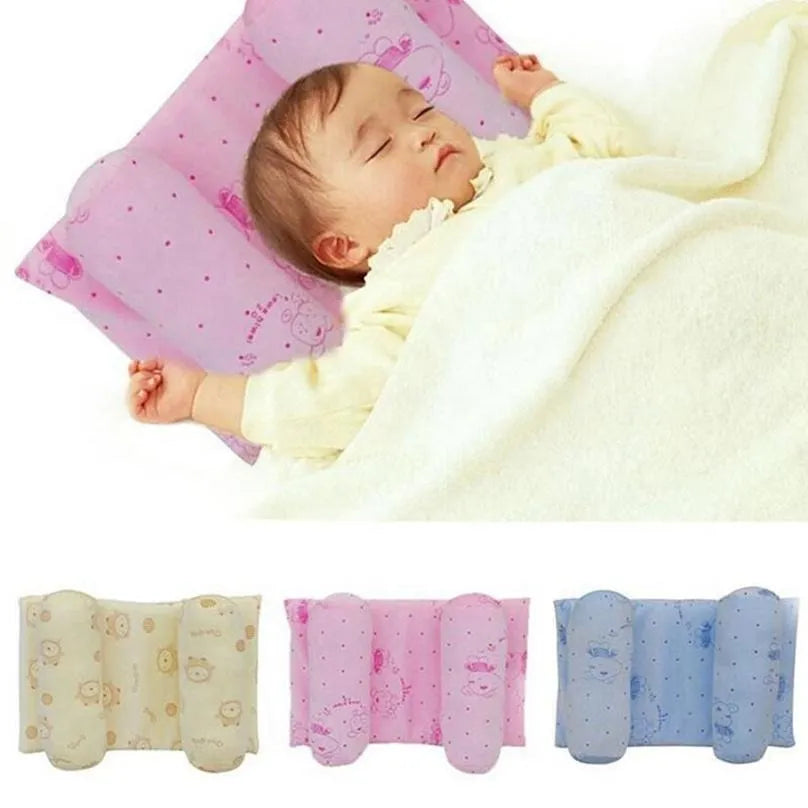 Baby head shaping support pillow with ergonomic design for newborns, featuring breathable memory foam and removable washable cover for feeding and tummy time support.