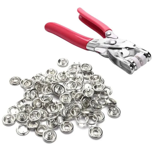 Metal snap button pliers kit with silver press buttons and DIY tool.

