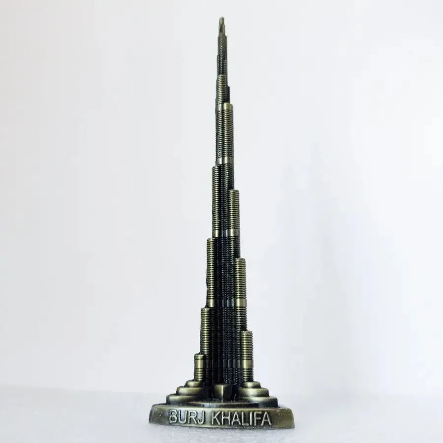 9 inch tall metal Burj Khalifa model on display shelf for home decor.