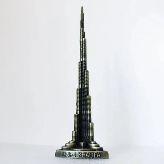 9 inch tall metal Burj Khalifa model on display shelf for home decor.