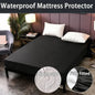 Waterproof mattress protector with elastic edges on a bed.
