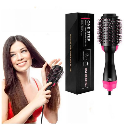 One Step 2-in-1 hair dryer and styler brush in hand, showing oval brush design.

